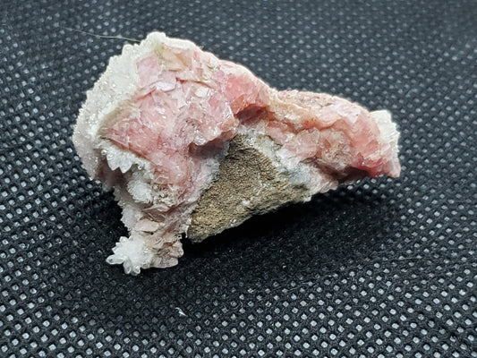 Rhodochrosite with Quartz specimen