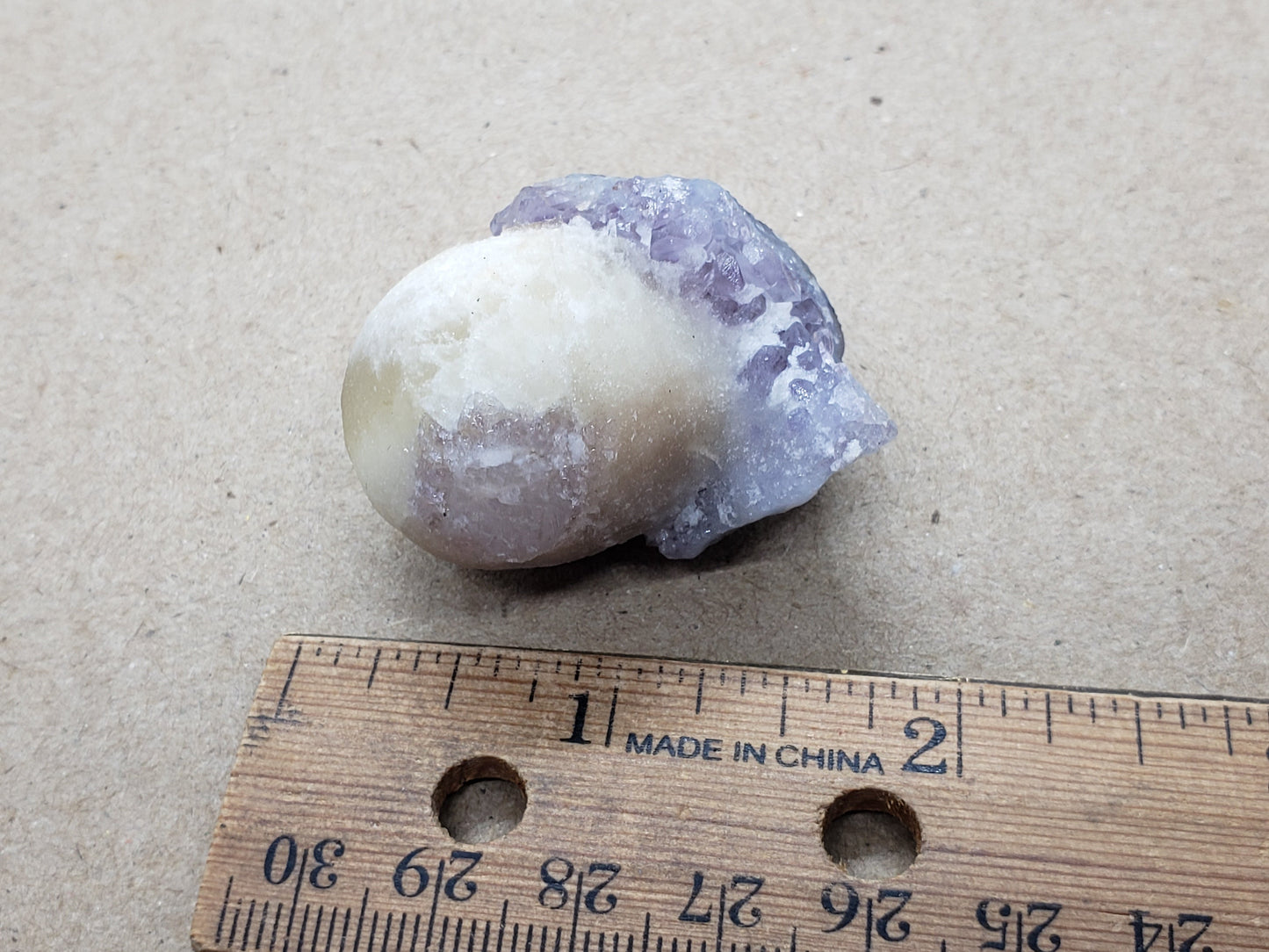 Fluorite ball on Amethyst specimen