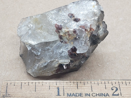 Spessartite Garnet on Quartz specimen