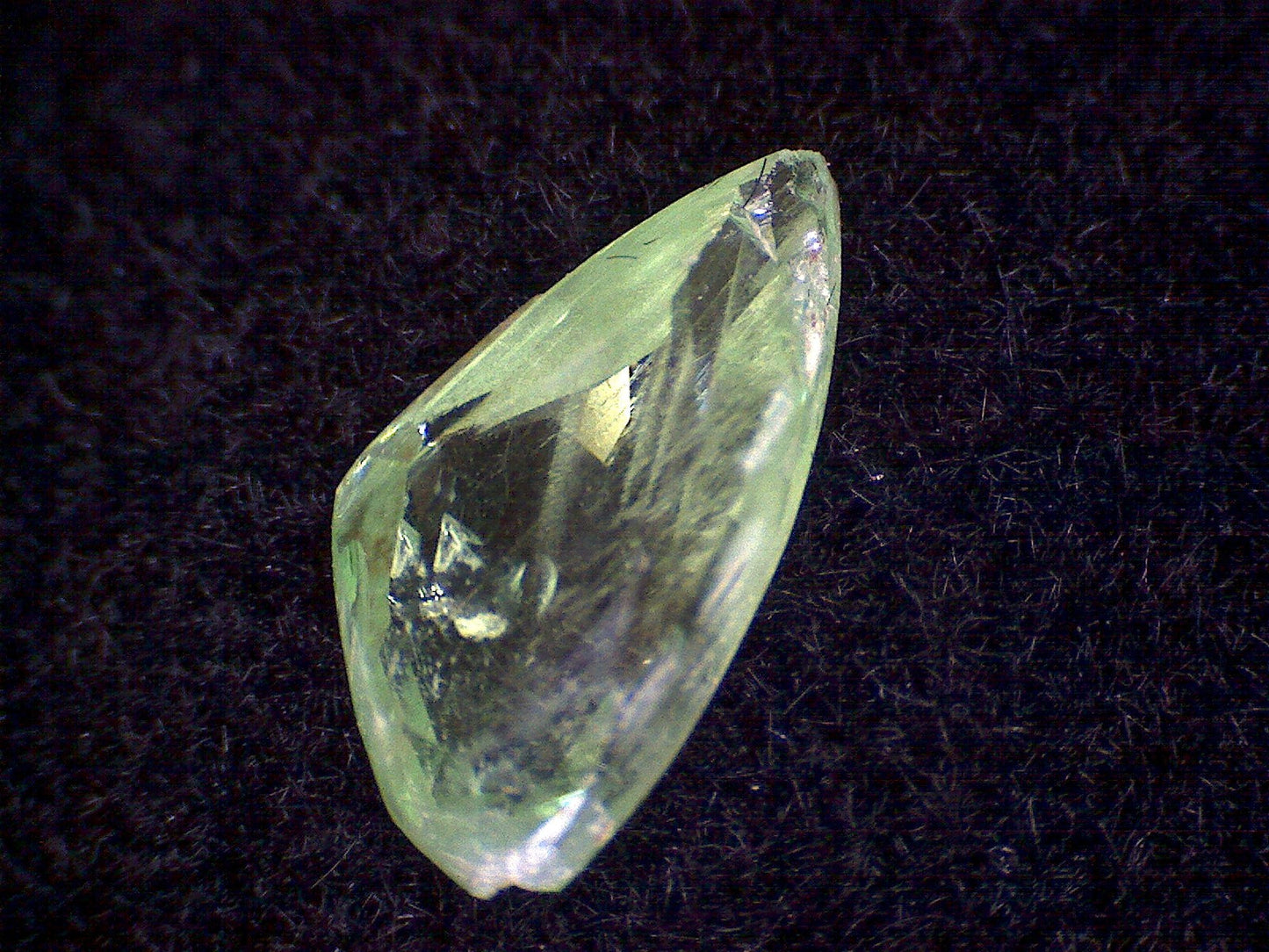 Hiddenite Facet