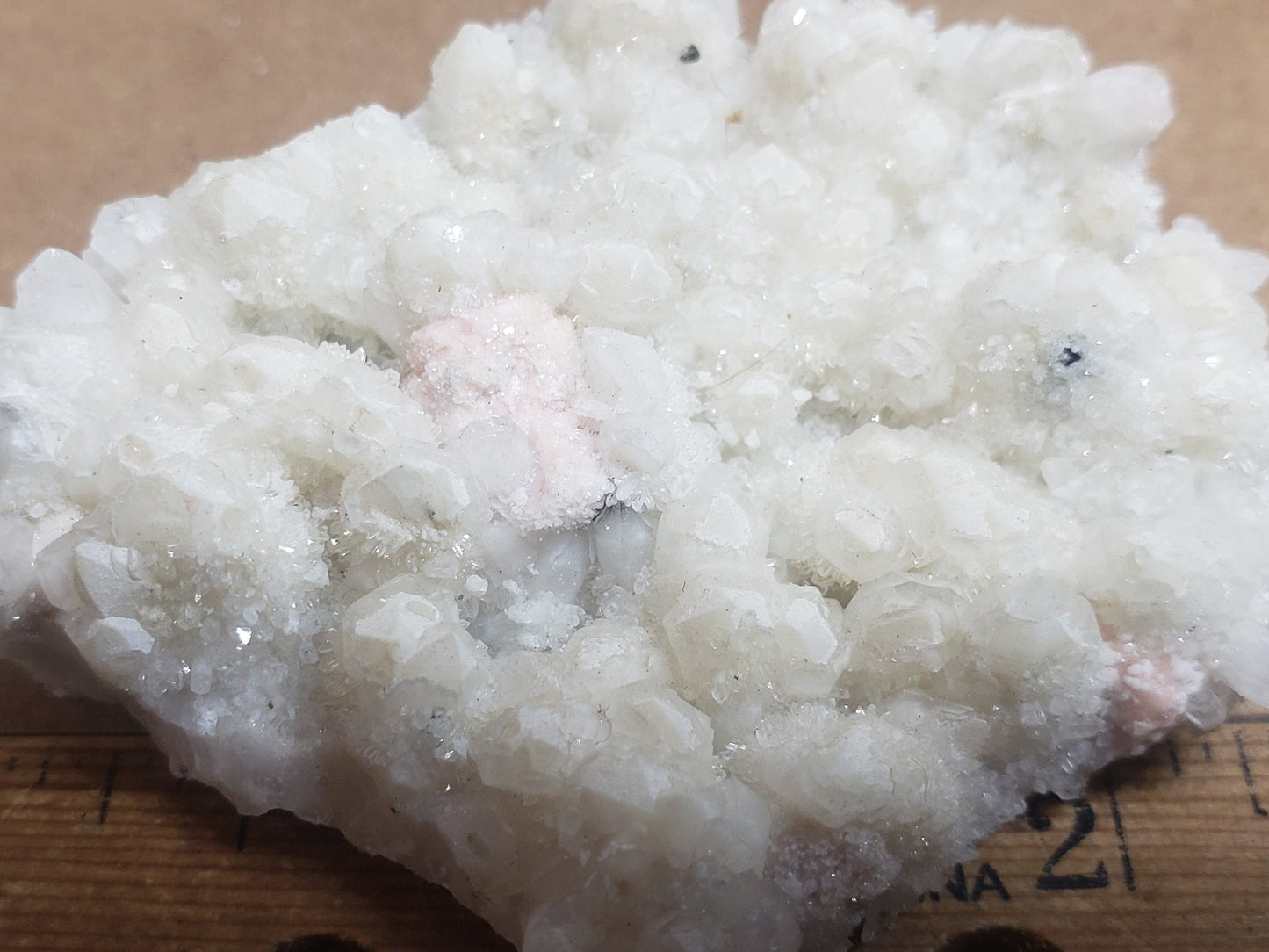 Rhodochrosite on quartz specimen