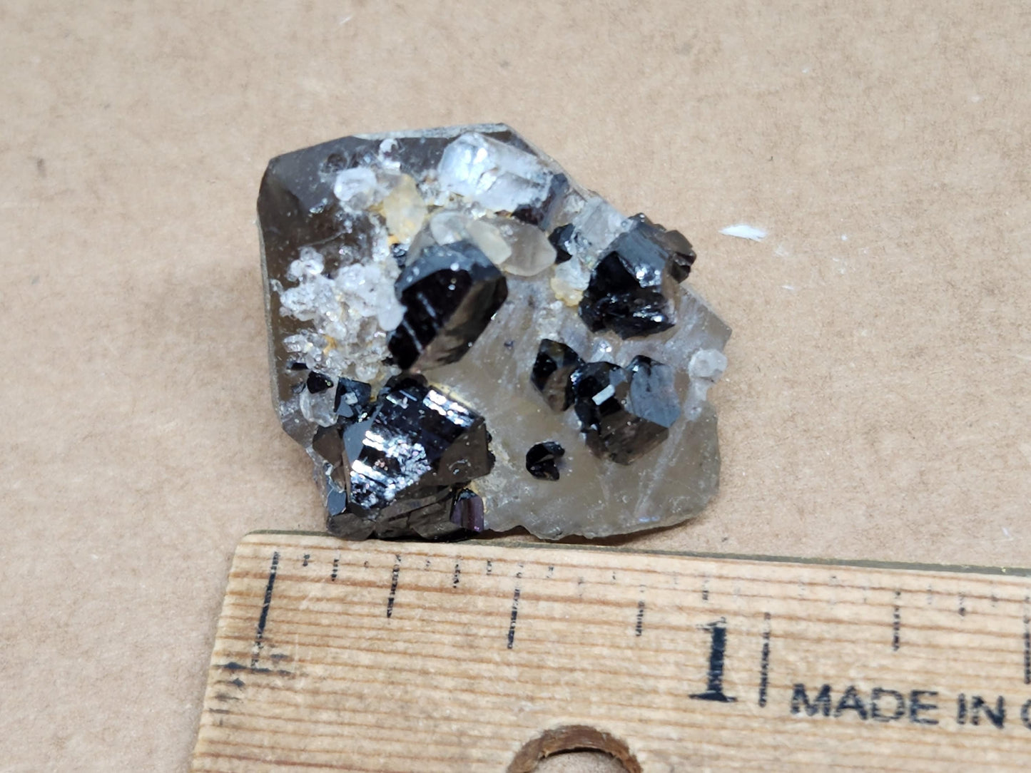 Cassiterite topaz on Smoky Quartz Crystal