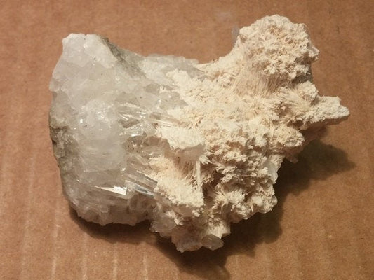 Calcite var manganoan on Quartz specimen